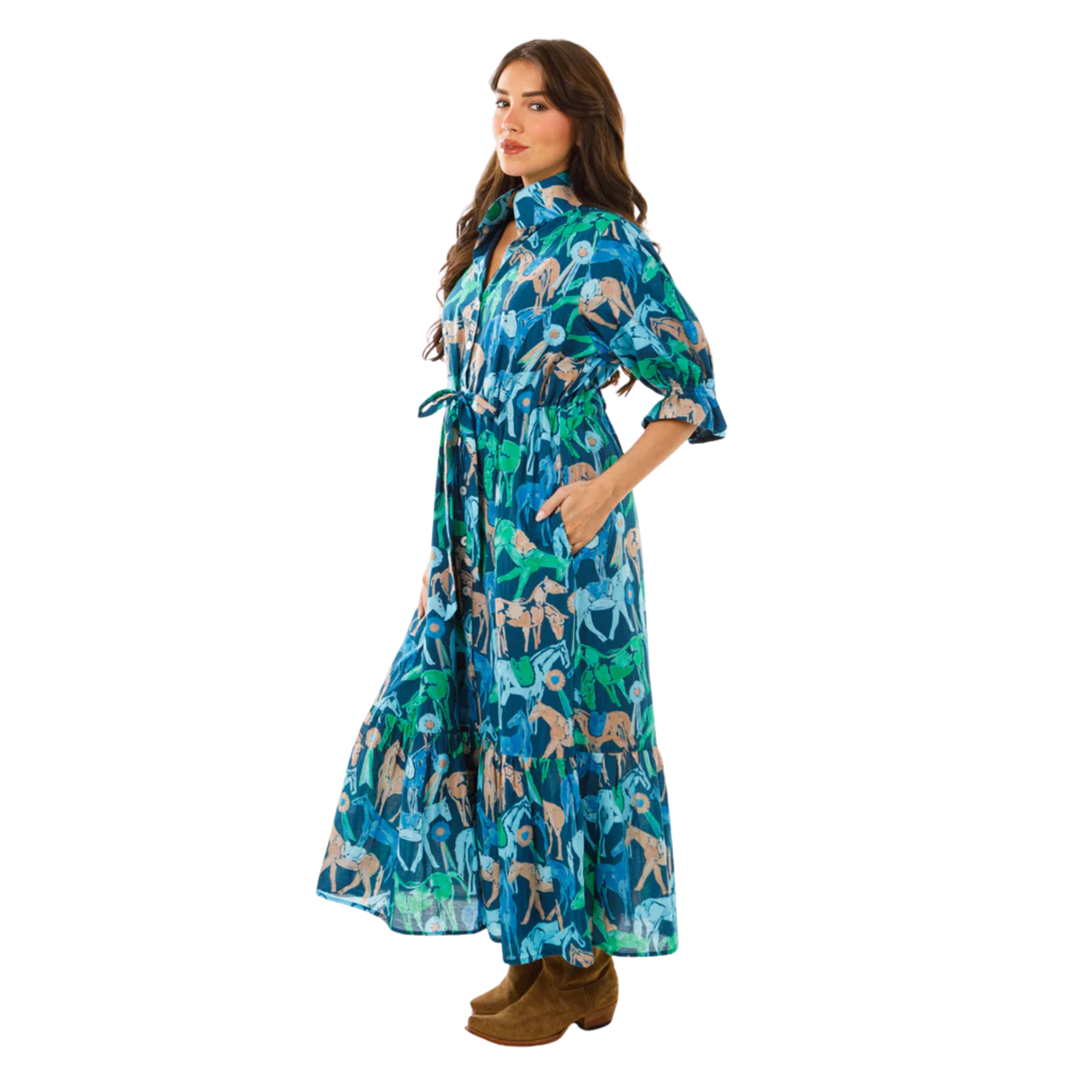 Woman wearing a long, patterned dress on a white background