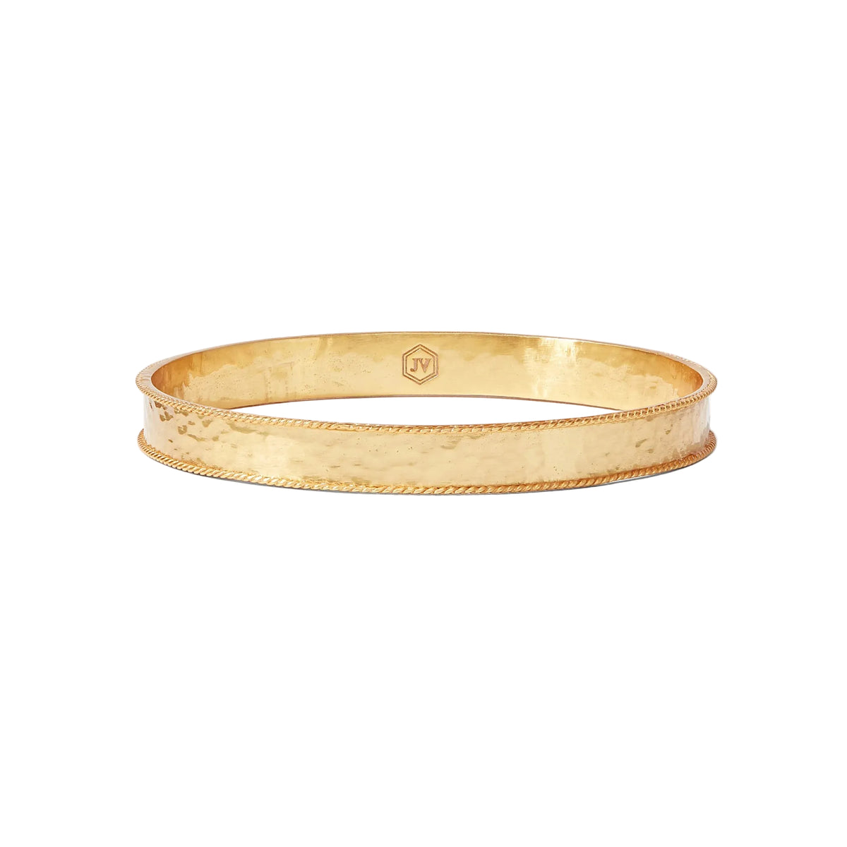 A hammered gold bangle bracelet with a twisted rope border and a small hexagonal logo mark on the inside, shown on a clean white background.