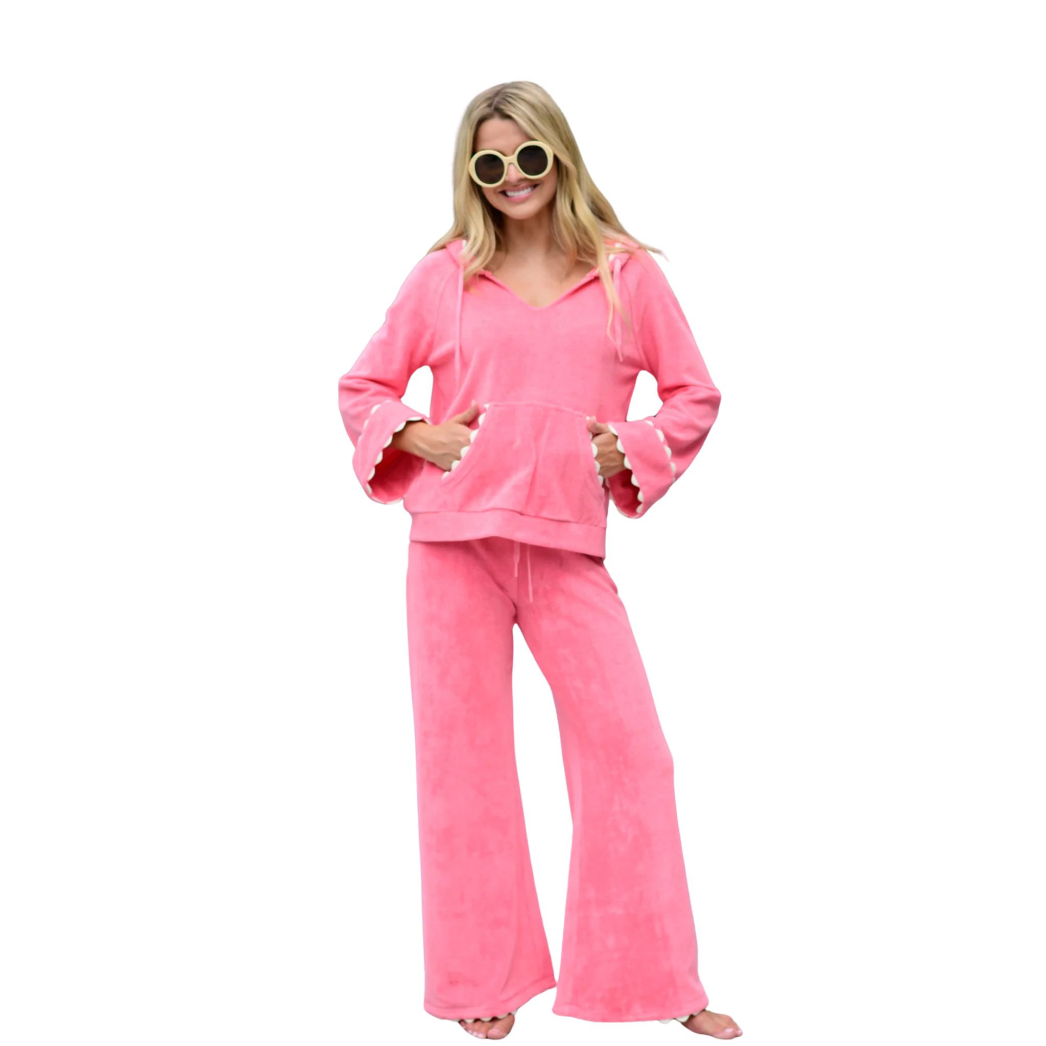 Woman wearing a pink outfit on a white background