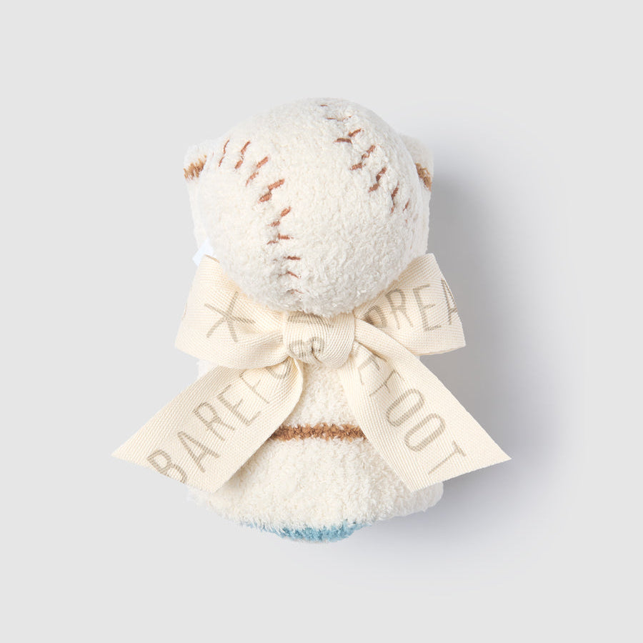 Decorative baseball with a bow and 'Barley' text on a light gray background