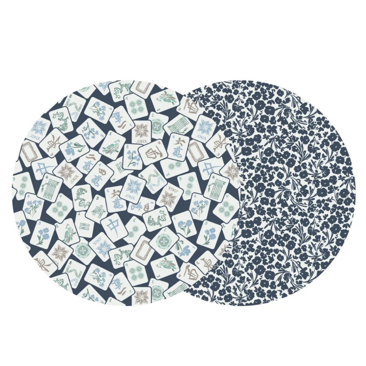 Two overlapping circular fabric swatches on a white background, showing navy blue patterns: one with scattered illustrated playing cards and one with a dense floral damask print.