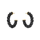Black twisted hoop earrings on a white background