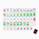 Set of colorful children's tiles with various designs and text on a white background