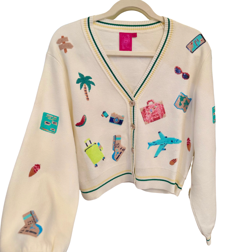Beige cardigan with colorful embroidered designs on a white background