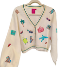 Beige cardigan with colorful embroidered designs on a white background