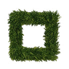 A square green faux boxwood leaf wall frame with dense, realistic foliage, isolated on a white background.