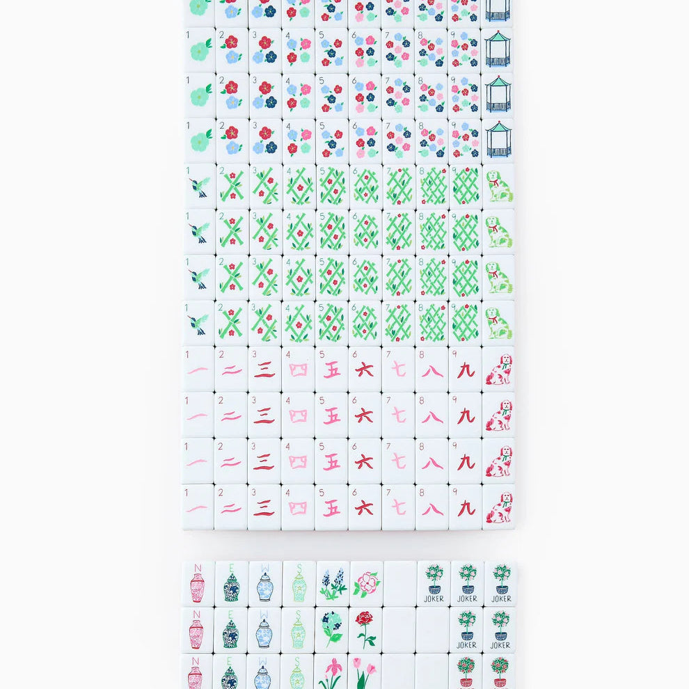 Set of colorful miniature items on a white background