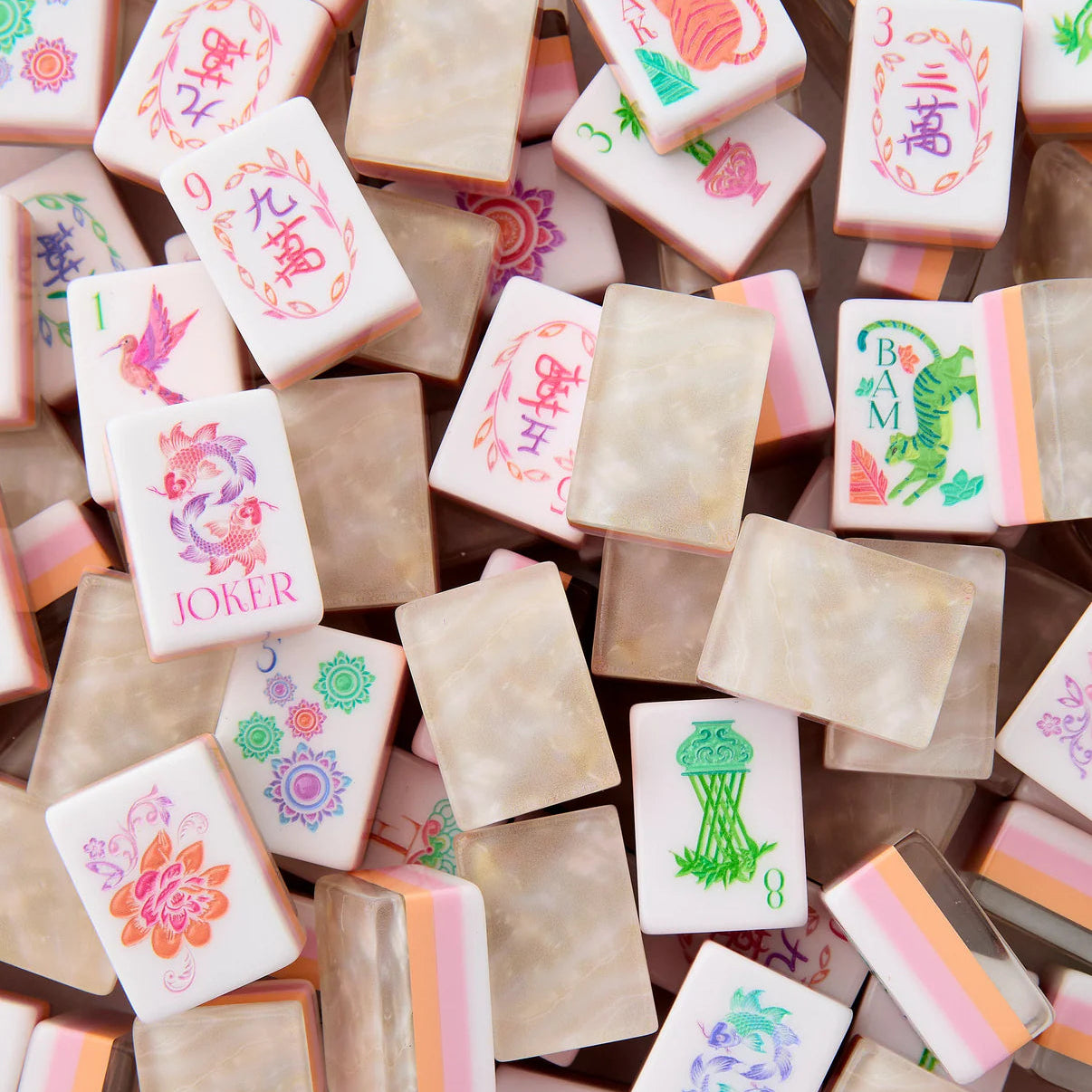 Collection of colorful stamp pads with various designs on a wooden surface