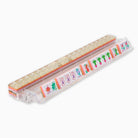 Rectangular container with colorful labels on a white background