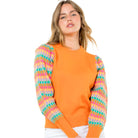 Knitted Bishop Sleeve Sweater in Orange - Fairley Fancy